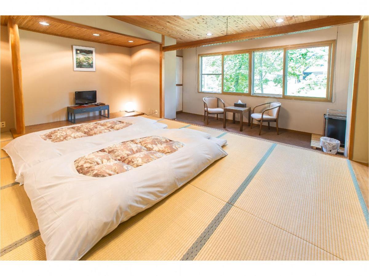 Bed and Breakfast Nomad Хакуба Екстер'єр фото