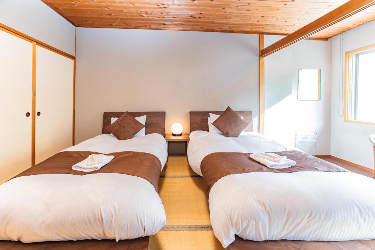 Bed and Breakfast Nomad Хакуба Екстер'єр фото